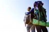 estar de passagem em inglês